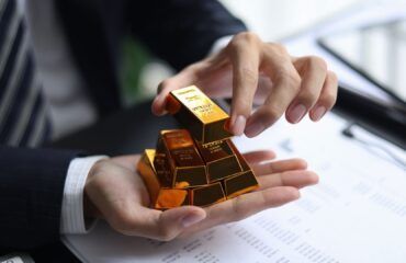 investment-in-gold-man-holding-bullion-in-office-2026-04-08-17-50-10-utc grovy developers