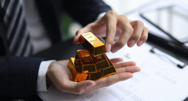 Gold vs Real Estate Dubai - Grovy Real Estate Developers