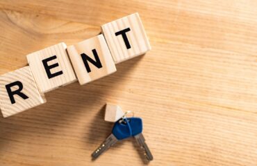 top-view-of-keys-with-key-chain-near-wooden-cubes-2026-01-06-00-34-49-utc rental market dubai
